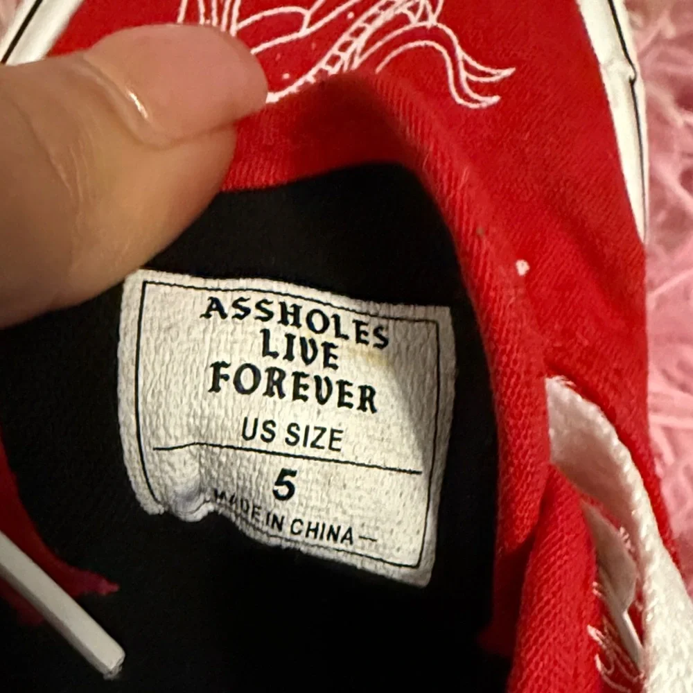 Stylish Red Kids Sneakers with Fun Print